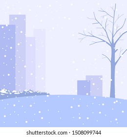 Winter cityscape, snowing in a city park.