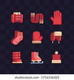 Winter clothes and accessories, cap covering ears, scarf, skates, knitted hat, mittens pixel art icon set, isolated vector illustration. Game assets 8-bit sprite. Design for sticker, logo, mobile app.