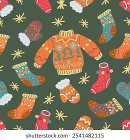 Winter clothes seamless pattern. Jumper, socks, gloves on green background. Christmas ugly sweater and warm clothing ornament. 