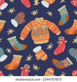 Winter clothes seamless pattern. Jumper, socks, gloves on blue background. Christmas ugly sweater and warm clothing ornament. 