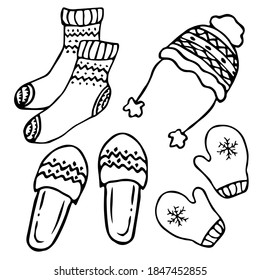 Winter clothes. Warm clothes doodle set. Hand drawing. Vector illustration.