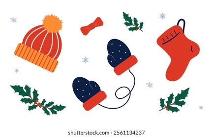 winter clothing and decorations with holly leaves on white background