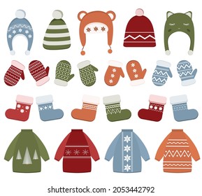 Winter clothing set with hats, sweater, socks, mittens. Clothes with different textures isolated on white background. Items for cold season. Collection of warm clothes for Christmas.