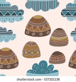 Winter clouds and rocks hand drawn seamless vector pattern