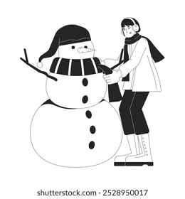 Winter coat woman tying scarf around snowman neck black and white 2D line character. Wintertime outdoor activity. Earmuffs asian female isolated vector outline person. Monochromatic spot illustration