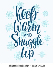 Winter cold lettering. Calligraphy postcard or poster graphic design sign element. Hand written vector style romantic quote. Keep warm and Snuggle up. Snowflakes decoration