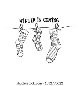 Winter is coming. Lettering. Knitted socks. Set. Isolated vector objects on a white background.