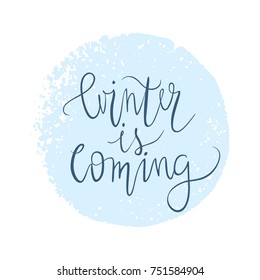 Winter is coming. Vector greeting card with hand drawn text  for invitation, greeting card, t-shirt, prints and posters. Modern calligraphy brush lettering.