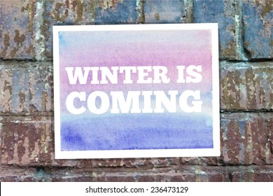 Winter is coming. Vector Typographical Watercolor Poster on a Brick Wall