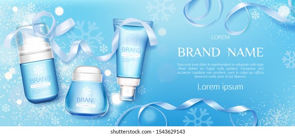 Winter cosmetic tubes and cream jar on blue background with snowflakes and ribbons. Cold season moisturizing beauty cosmetics product bottles set mock up line. Realistic 3d vector illustration, banner