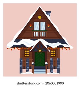 Winter cottage with christmas wreath and lights