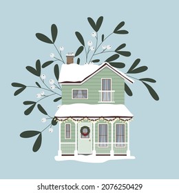 Winter country house, snow and mistletoe. Facade with Christmas lights. Holiday and celebration. Modern green building with roof, windows and door. Lovely family home with white railing. Cute cottage