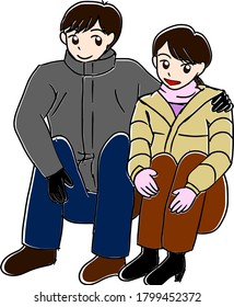 A winter couple sitting and posing
