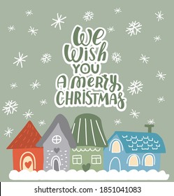 Winter cozy houses. We wish you a merry Christmas lettering. Christmas and Winter Holiday Card. Cute hand drawn illustration and lettering for sticker