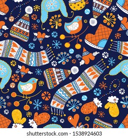 Winter cozy seamless pattern with warm clothes, snowflakes, tea and birds.
