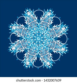 Winter design element. Stylized Christmas snowflake on blue background. Ornate shape.