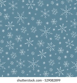 Winter doodles hand drawn snowflakes seamless pattern. Cute, simple vector snowflakes for postcard and poster graphic design for textile, wrapping paper, hand drawn style christmas winter backgrounds.