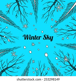 winter or early spring background with trees and snowflakes, bright blue sky, text box, greeting card or web site header