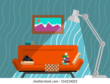 Winter evening in the cozy apartment on the couch with a blanket, affectionate cat, interesting books and a cup of hot coffee under the warm light of the lamp