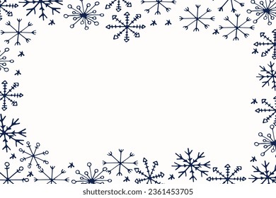 Winter frame made of snowflakes with space for text.