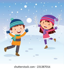 Winter fun. Cheerful kids throwing snowballs or playing in the snow.