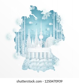 Winter in Germany with map concept for travel and tour advertising concept with world famous landmark in paper cut style vector illustration.