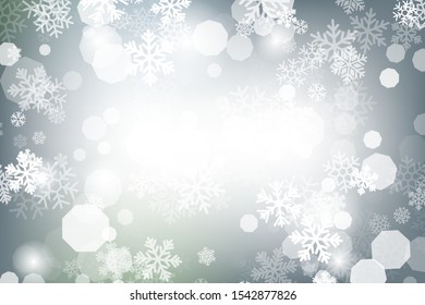 Winter glowing background. Vector holiday banner with lights, bokeh and snowflakes. Seasonal soft backdrop.