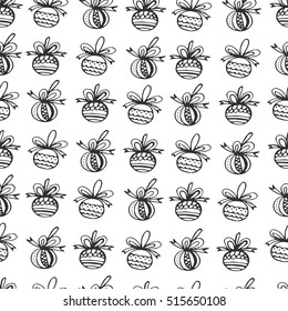 Winter hand drawn seamless pattern with Christmas decorations on white background. Vector sketch illustration with cute balls . Festive theme.