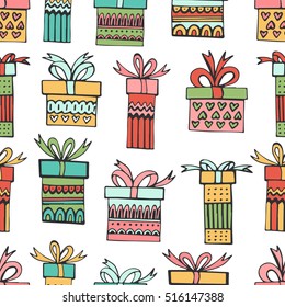 Winter hand drawn seamless pattern with gifts on white background. Vector sketch illustration with cute christmas boxes. Festive theme.