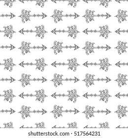 Winter hand drawn seamless pattern with Christmas arrows on white background. Vector sketch illustration. Festive theme.