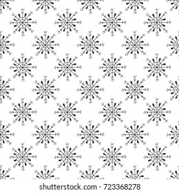 Winter hand drawn seamless pattern with snowflakes. Vector illustration.