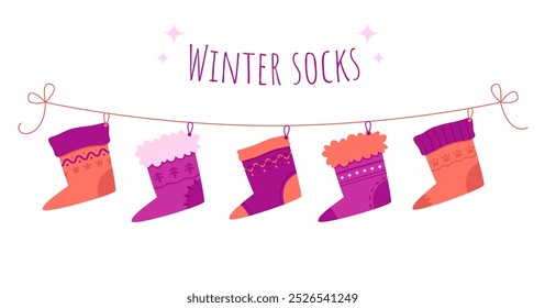 Meias felizes de inverno em um conjunto de cordas