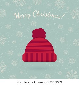 Winter hat on winter backdrop. Holiday card template. Retro style for Christmas and New Year design.