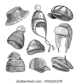 Winter hats engraved illustrations set. Hand drawn sketch of warm fur hats with and without pompons or ear flap, beanie, beret, cap on white background. Warm clothes, winter, headwear concept