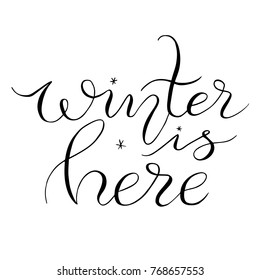 Winter is here hand written text. Brush lettering on white background. Vector card design with calligraphy. Cold season typography. Season greeting card, banner template. 
