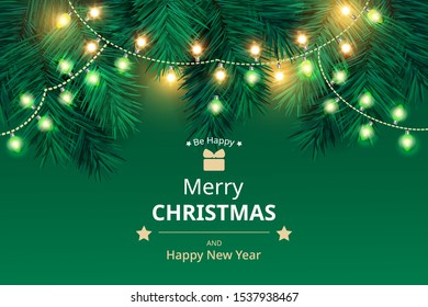 Winter holiday background. Border with Christmas tree branches and lights isolated on green.  Great for New year cards, banners, headers, party posters.
