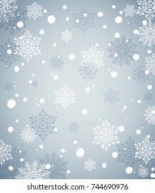Winter Holiday Background with snow. Blue Christmas snowflakes background for banner or greeting card.