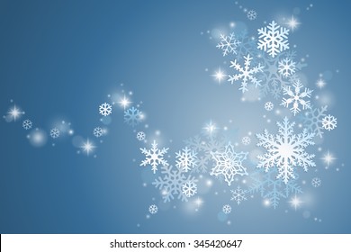 Winter holiday background with swirl of snowflakes on blue