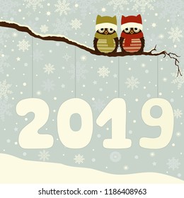 Winter holiday greeting card with cute owls 