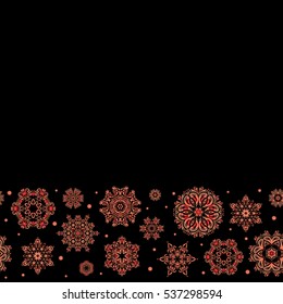 Winter Holiday Knitted Pattern with brown, orange and red Circles, Dots and Snowflakes On a Black Background. Seamless vector horizontal background.