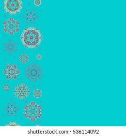 Winter Holiday Knitted Pattern with Circles, Dots and Snowflakes On a blue Background with copy space (place for your text). Seamless vector vertical background.