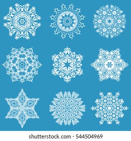 Winter Holiday Knitted Pattern with Circles, Dots and Nine vector Snowflakes set On a blue Background.