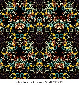 Winter Holiday Knitted Pattern with green, beige and yellow Circles, Dots and Snowflakes On a Black Background. Seamless vector background.