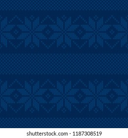 Winter Holiday Knitted Pattern with Snowflakes Ornament. Vector Seamless Background with Shades of Blue Colors. Wool Knit Texture Imitation