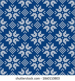 Winter holiday ornament with snowflakes. Christmas and New Year wool knitted sweater. Seamless pattern, vector illustration, traditional background.