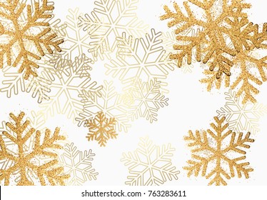 Winter holiday pattern with golden bright shining snowflakes with gold glitter.