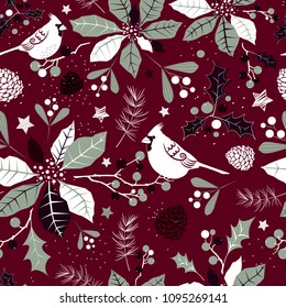 Winter holiday seamless background with stylized flowers of poinsettia, holly berries, cardinal birds, mistletoe sprigs and pine cones