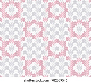 Winter holiday seamless knitting pattern in pink and white colours. Knitted sweater design