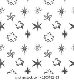 Winter holiday seamless pattern with doodle hand drawn stars. Scandinavian style.