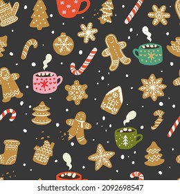 Winter holiday seamless pattern with hand drawn cartoon sweets - gingerbread cookies, candy cane, cups with hot chocolate. Cozy Xmas tiling background for wrapping paper, greeting card, wallpaper